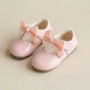 Ballerine bébé nœud papillon laquée rose